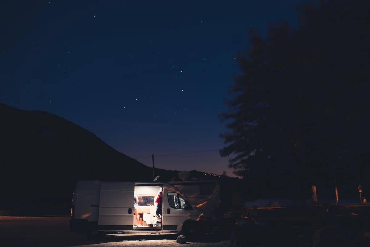 The camper lit up at a quiet overnight stop